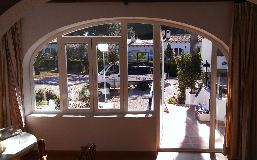 Bespoke arched unit with door and window